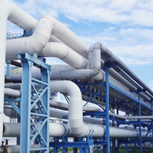 Closeup-of-industrial-pipelines-around-a-factory